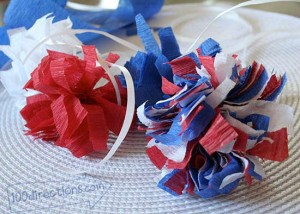Easy patriotic pom pom decor with crepe paper streamers