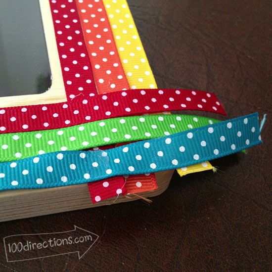 Add ribbon to the frame, don't adhere the corners yet