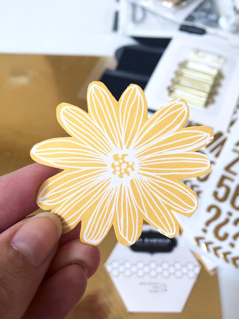 Cut out individual flowers from the patterned papers