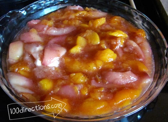 Simmer peach cobbler filling ingredients until peaches are soft