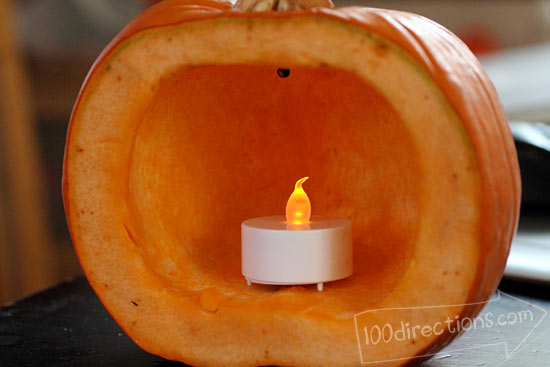 Preparing pumpking to make a pumpkin luminary