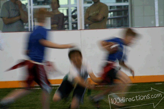 My youngest son diving for a tackle at a flag football game.