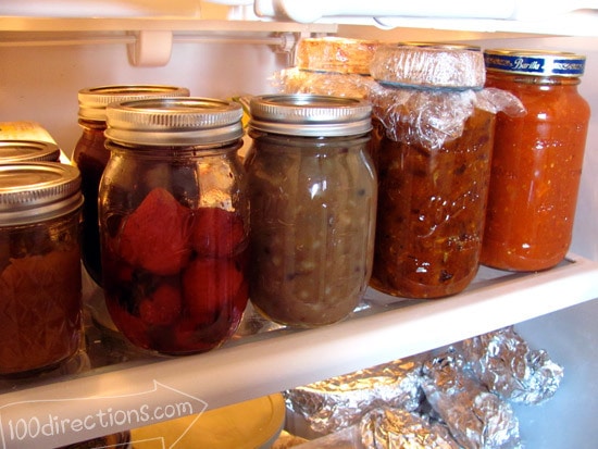 Filling my fridge with jars of food