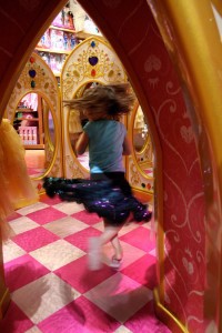 Playing at the Disney Store - twirling in the castle