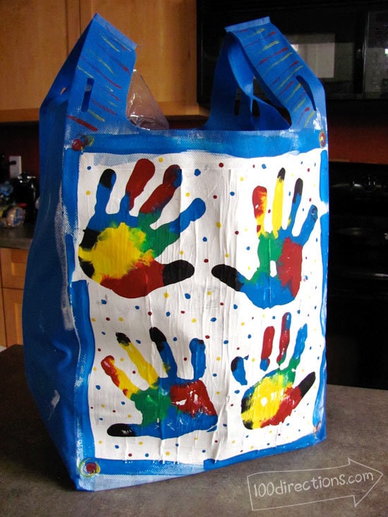 Colorful painted handprint shopping bag