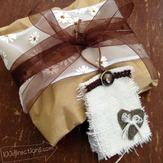 Fabric gift tag on gift packaging by Jen Goode