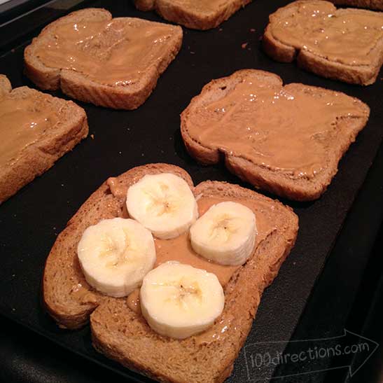 Making a toasted peanut butter and banana sandwiches