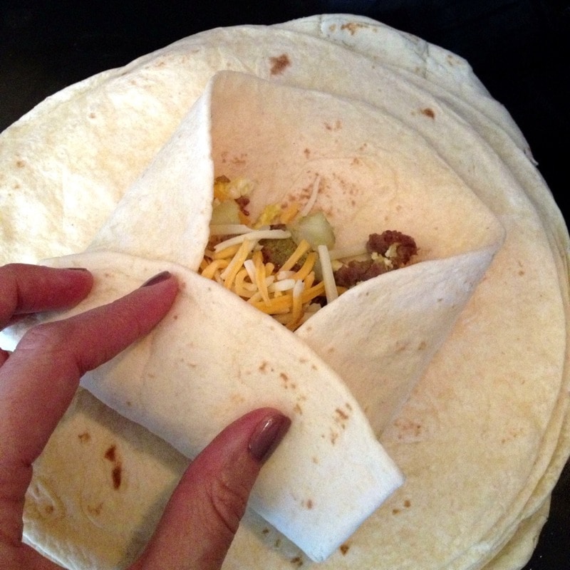 Fold torilla to make easy breakfast burritos