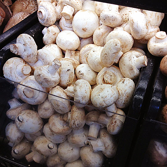 Bin of mushrooms