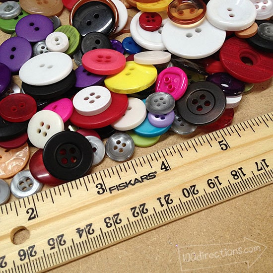 Buttons and a wood Fiskars ruler