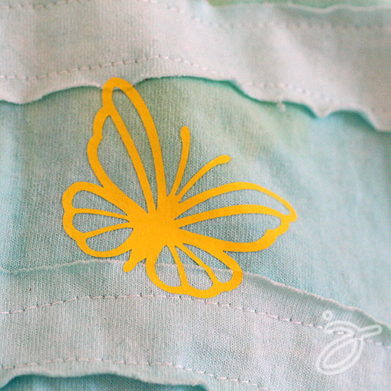 Iron-on butterfly cut out made with the Cricut mini
