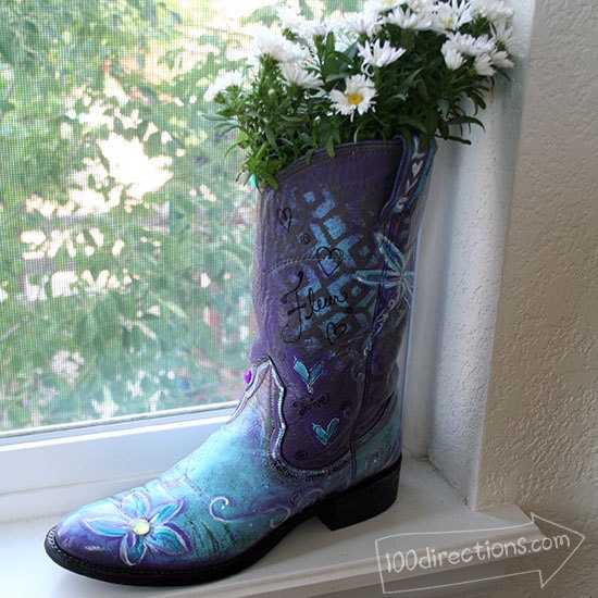 Hand painted cowboy boot flower vase created by Jen Goode