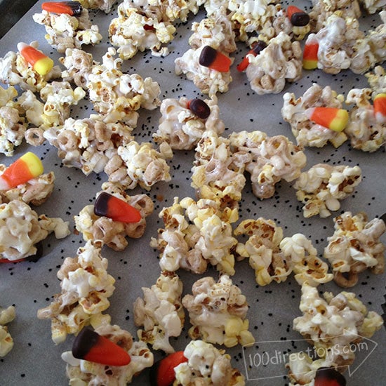 Add Candy Corn and Bake popcorn marshmallow clusters