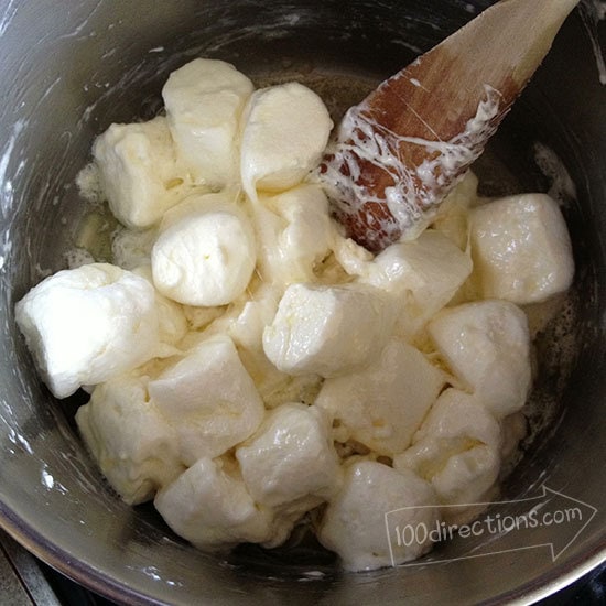 Heat marshmallows and butter to melt