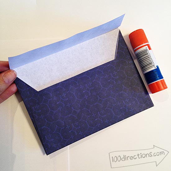 Glue envelope flaps (bottom and sides)