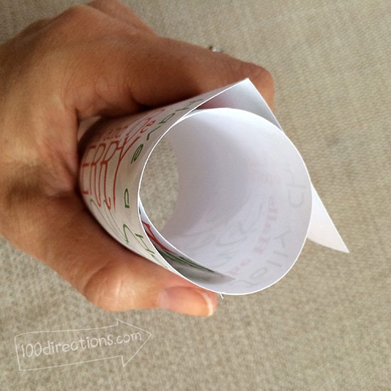 Roll the paper to create a curve