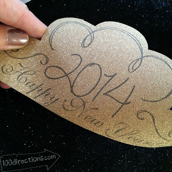 Print new years eve crown onto glitter paper