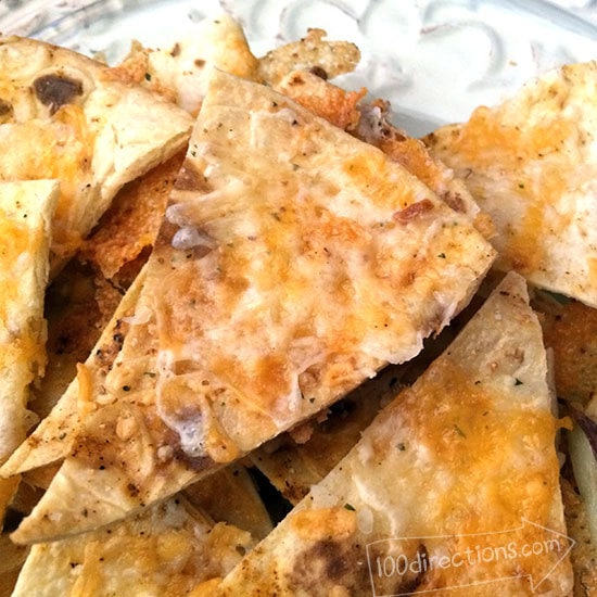 Melted cheese tortilla chip snack