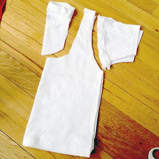 Cut off the sleeves and neck hole of the t-shirt
