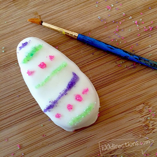 Decorate a Reese's White Chocolate Egg with sprinkles