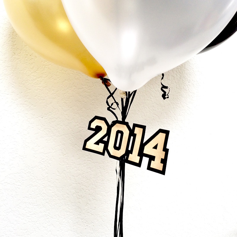 Use school colors and then add a cut out 2014 to your grad party balloons