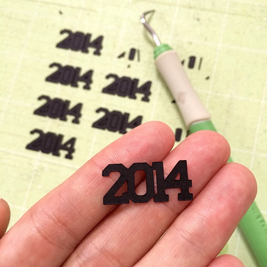 Making 2014 grad confetti with a Cricut