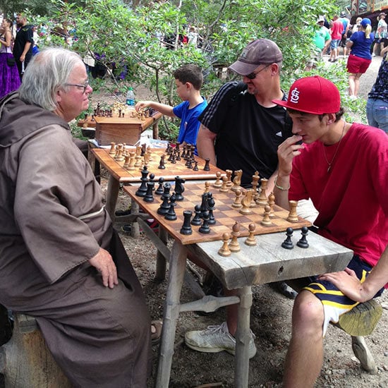 All 3 of my boys playing chess