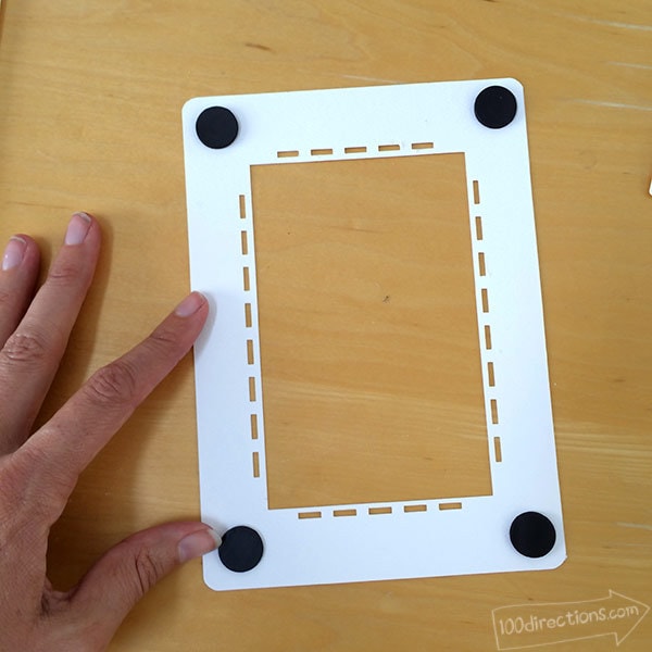 Add magnets to the back of your cut out frames