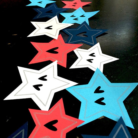 Arrange paper stars before gluing in place