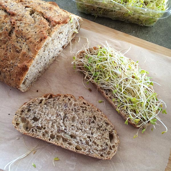 Add sprouts to one slice of bread