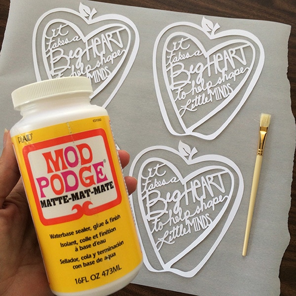Use Mod Podge to create a dimensional art piece with cardstock cut-outs