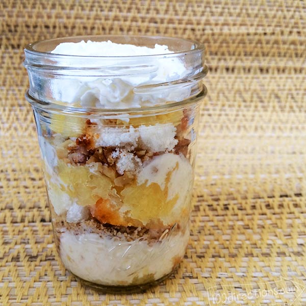 Layers of pineapple, banana, coconut and angel food cake