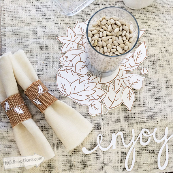 Use cut out leaves to make a pretty place setting for fall - designed by Jen Goode