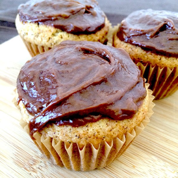 Top banana bread muffins with frosting