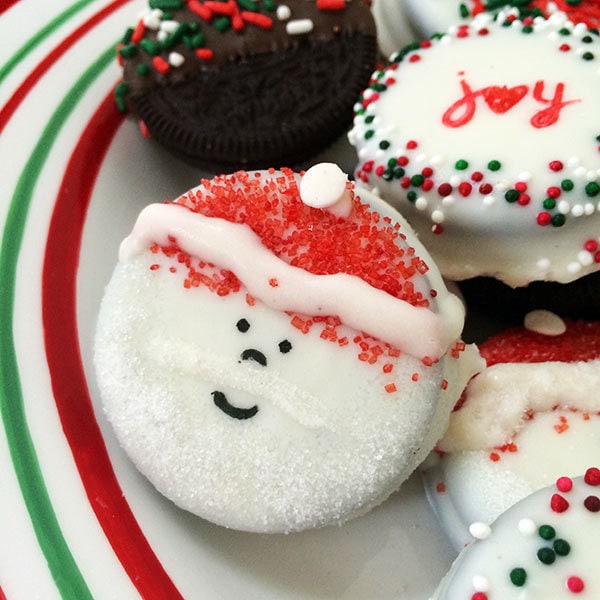 Make Santa cookies with Chocolate Dipped OREO cookies