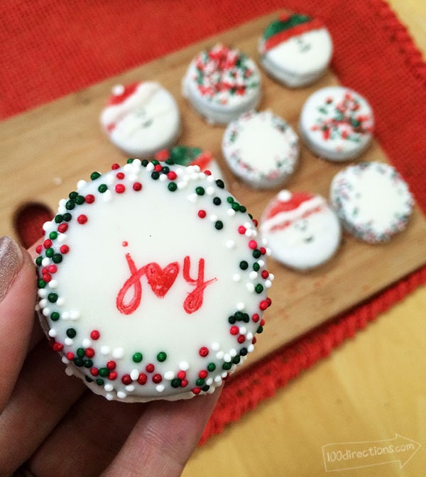 Write on chocolate dipped OREOs with a candy pen