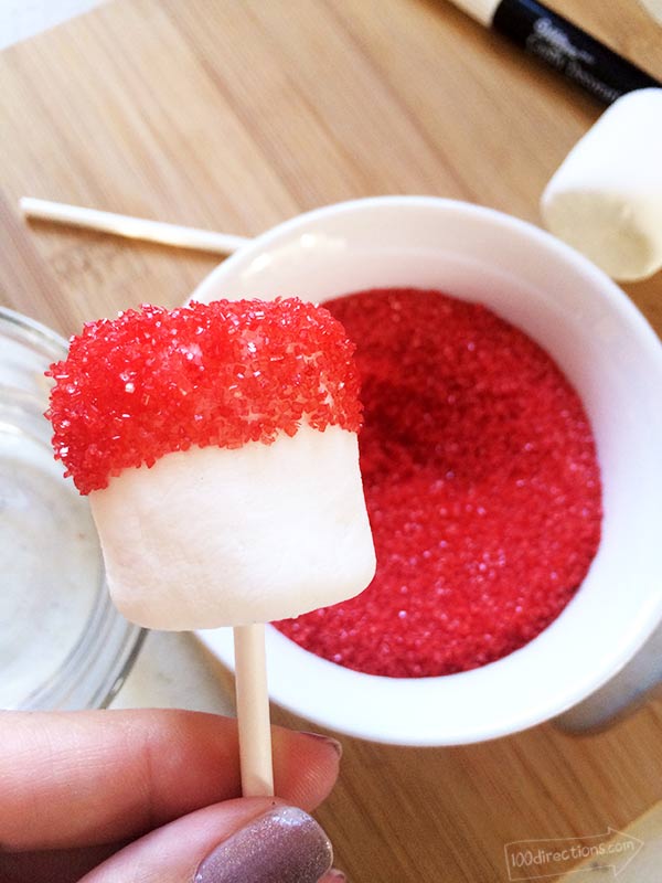 Dip wet marshmallow into sprinkles