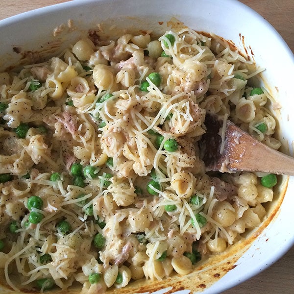 Stir in cheese and tuna and peas