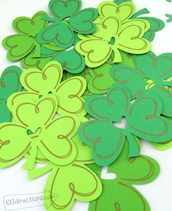 Shamrocks cut from different shades of green cardstock - designed by Jen Goode