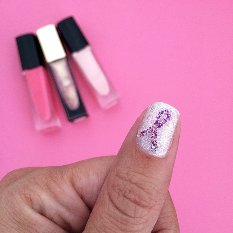 Support Ribbon nail Art with multi-colored-glitter-nail polish