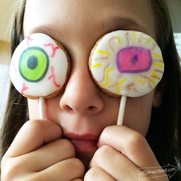 Draw your own eyeball on frosted cookie pops