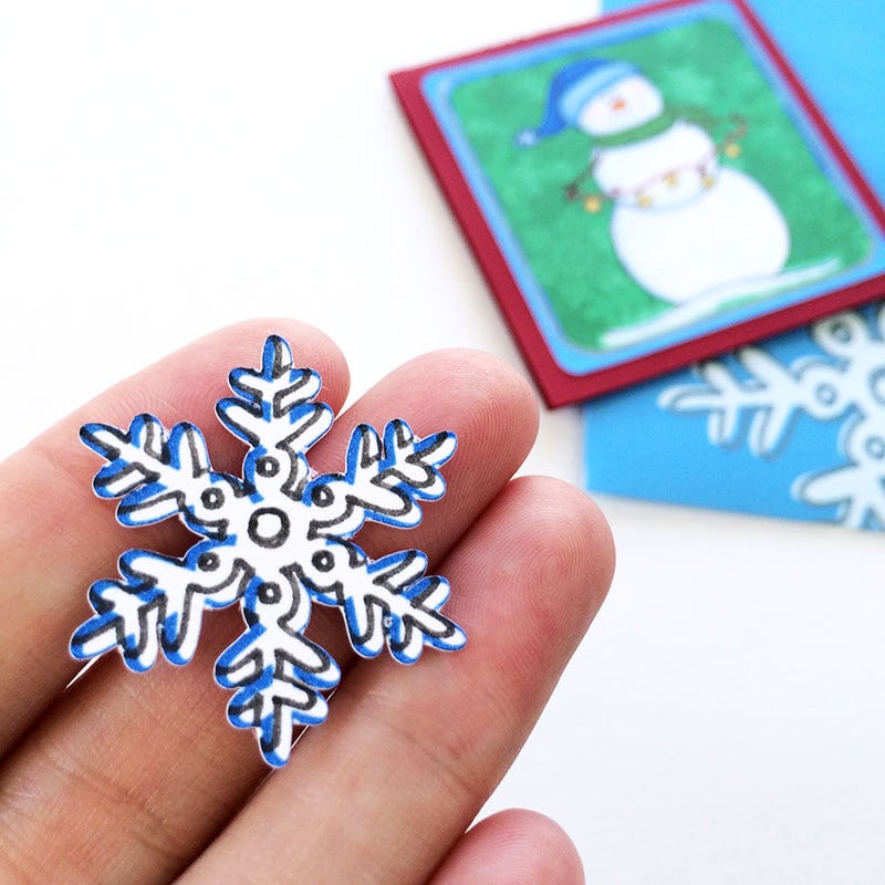Make a mini snowflake to accent your card or seal the envelope