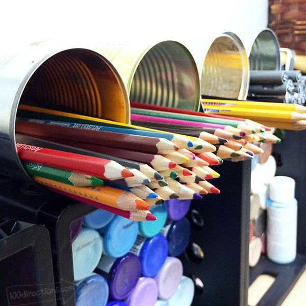 Storing pencils and pens in cans