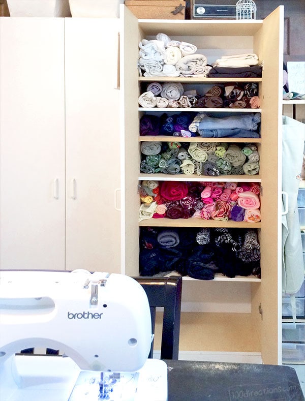 Organized sewing fabric cabinet