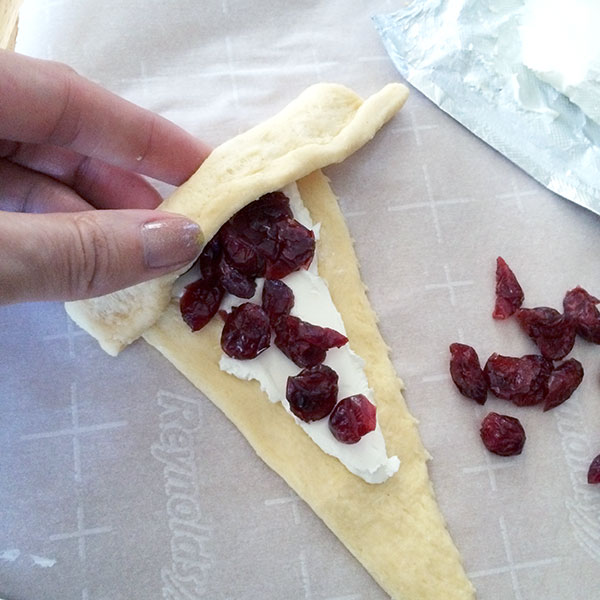 Add cream cheese and cranberries