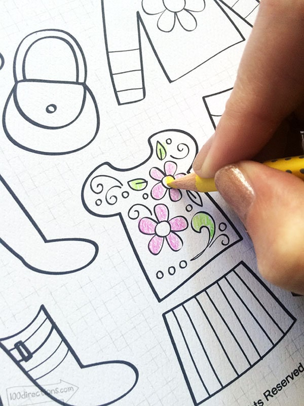 Coloring a printable paper doll