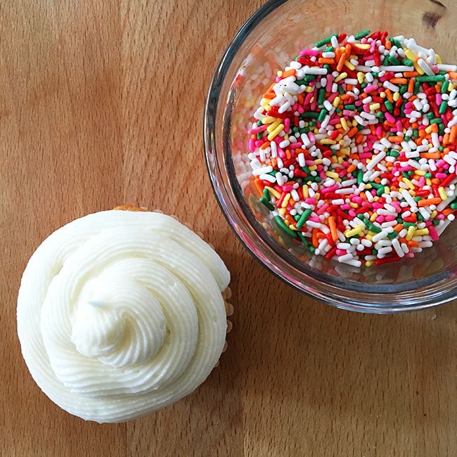 Adding sprinkles to cupcakes in 1 easy step