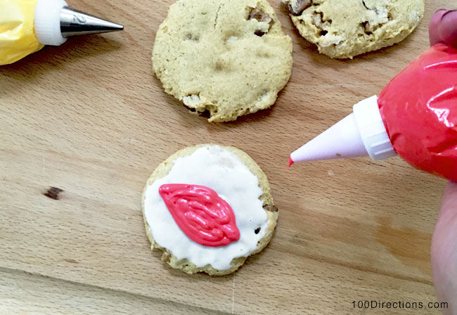 Decorating fall cookies with leaves