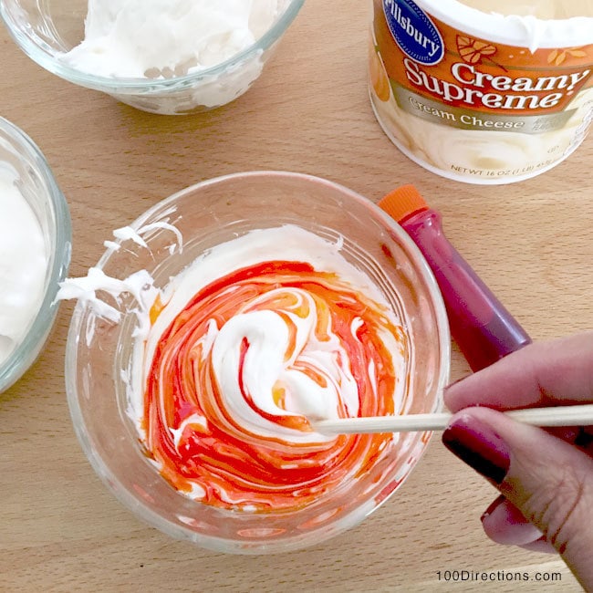 Mix food coloring into frosting