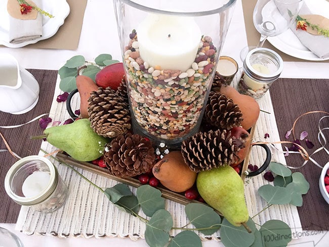 Layer pears and pinecones to the tray